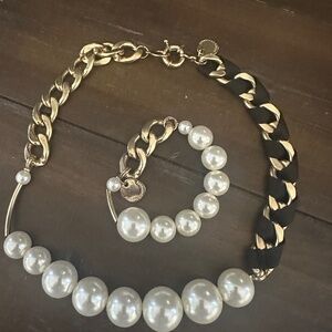 Modern and classy pearl, golden and black necklace & bracelet Adolfo Dominguez